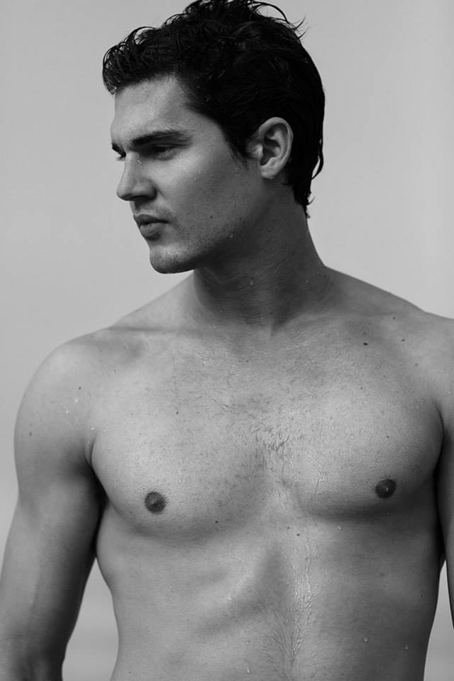 Jason in a black-and-white profile portrait