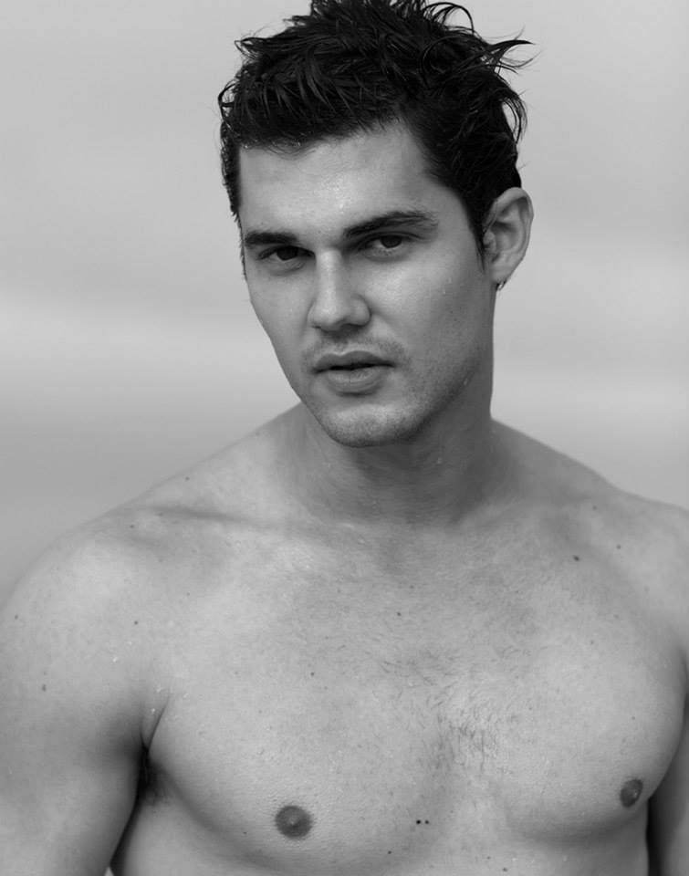 Jason in a black-and-white front-facing portrait