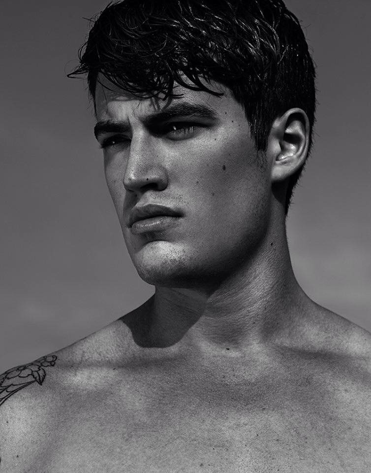 Stephen in a black-and-white close fashion portrait